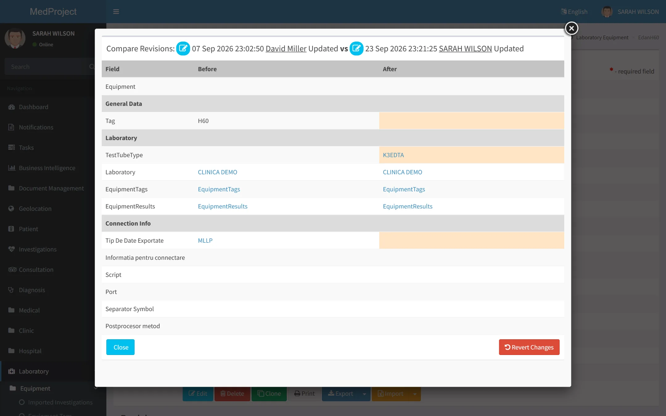 Two revisions compared field by field, with the changed values highlighted and a Revert Changes button